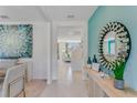 Bright entryway featuring modern decor, tile flooring, and an inviting open view to the living space at 279 Wisteria Ct, Deltona, FL 32738