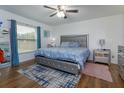 Serene bedroom with a plush, oversized bed, soft accents, and natural light at 4843 Pierce Arrow Dr, Apopka, FL 32712
