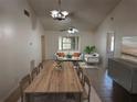 Bright living and dining space enhanced by modern furniture and neutral decor, bathed in natural light at 3739 S Fern Creek Ave, Orlando, FL 32806