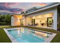 A stunning outdoor space featuring a private pool and seamless transition to indoor living area at 2412 Chantilly Ave, Winter Park, FL 32789