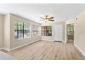 Inviting living room with large windows and contemporary flooring at 325 Forestway Cir # 104, Altamonte Springs, FL 32701
