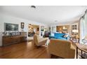 Bright living room showcasing hardwood floors, comfortable seating, and an open floor plan at 1516 Arthur St, Orlando, FL 32804