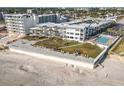 Aerial view of oceanfront condos at the Ocean Jewels Club with pool, lounge area and beach access at 935 S Atlantic Ave # 355, Daytona Beach, FL 32118