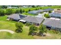 Aerial view of homes backing to a golf course, offering scenic views and recreation at 5215 Nw 34Th St, Ocala, FL 34482