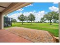Enjoy beautiful golf course views from this brick-paved outdoor patio at 5215 Nw 34Th St, Ocala, FL 34482