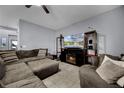 Comfortable living room with modern decor, ceiling fan, and tile flooring at 1003 Nathan Ridge Rd, Clermont, FL 34715