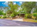 Charming home featuring a well-maintained exterior, lush landscaping and inviting curb appeal at 508 W Plantation Blvd, Lake Mary, FL 32746