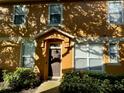 Charming entrance with well-maintained landscaping and an inviting front door at 2330 Little Gem Loop, Sanford, FL 32773