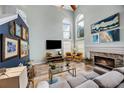 Spacious living room features high ceilings, abundant natural light, and stylish decor at 383 Remington Dr, Oviedo, FL 32765