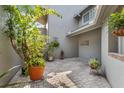 Private paved patio surrounded by lush greenery, perfect for outdoor relaxation and entertaining at 3987 Lancashire Ln # 3987, Longwood, FL 32779