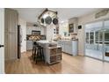 Bright kitchen with stainless appliances, island, and plenty of cabinet space at 4927 Fiske Cir, Orlando, FL 32826