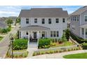 Attractive two-story home with a covered porch and manicured landscaping at 1071 Kershaw Dr, Winter Garden, FL 34787