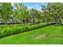 Lush lawns and vibrant flowers highlight this community's landscaping at 501 Water St # 501, Celebration, FL 34747