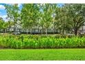 Well-maintained community grounds with lush landscaping, flowers, and manicured lawns at 501 Water St # 501, Celebration, FL 34747