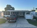 Charming single-story home with covered parking and decorative landscaping at 816 Polo Park East Blvd, Davenport, FL 33897
