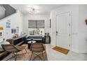 Modern living room offers ample seating, natural light, and contemporary design at 8160 Iron Mountain Trl, Windermere, FL 34786