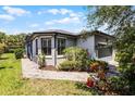 Charming home featuring a two-car garage, well-maintained landscaping, and inviting curb appeal at 532 Casanova Ct, Kissimmee, FL 34759