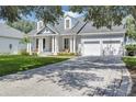 Charming home with a driveway and meticulously kept landscaping at 8430 Woburn Ct, Windermere, FL 34786