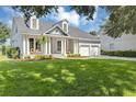 Beautiful home featuring manicured lawn and a two-car garage at 8430 Woburn Ct, Windermere, FL 34786