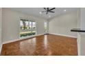Bright and airy living room with hardwood floors, vaulted ceilings, and natural light at 1120 Courtland St, Orlando, FL 32804