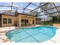 Inviting screened-in pool area features a spacious patio, perfect for outdoor entertaining and relaxation at 196 Morning Glory Dr, Lake Mary, FL 32746