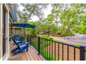 Relaxing front porch with outdoor seating and views of the landscaped surroundings at 607 W Club Blvd, Lake Mary, FL 32746