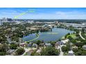 Beautiful aerial view of a neighborhood with lakes and Downtown Orlando on the horizon at 1010 Terrace Blvd, Orlando, FL 32803