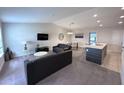 Living room with carpet, modern furniture and open floor plan at 123 Kenny Blvd, Haines City, FL 33844