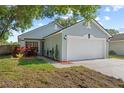 Charming single-story home with well-manicured lawn and inviting curb appeal at 202 Twisting Trl, Orlando, FL 32825