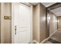 Hallway view of unit 1509 featuring neutral walls, carpet and contemporary lighting at 2305 Edgewater Dr # 1509, Orlando, FL 32804
