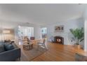 Bright living room with hardwood floors and decorative fireplace at 927 Boardman St, Orlando, FL 32804
