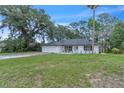Beautiful one-story home with a two car garage and a well manicured yard at 37 N Tymber Crk, Ormond Beach, FL 32174