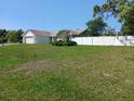 Well-maintained house with a big manicured front lawn at 1100 Peak Cir, Deltona, FL 32738