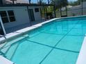Inviting in-ground pool with ample space for outdoor enjoyment at 1100 Peak Cir, Deltona, FL 32738
