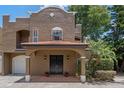 Beautiful two-story home with a covered entrance, a red tile roof, and an attached garage, showcasing its classic architectural style at 2238 Hawick Ln # 2238, Winter Park, FL 32792