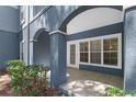 Cozy covered patio with tiled floor, perfect for outdoor seating and relaxation at 3561 Conroy Rd # 216, Orlando, FL 32839