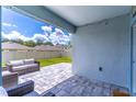Relaxing covered lanai with comfortable seating, perfect for enjoying the outdoors at 3723 Alder Bark Ln, Sanford, FL 32773