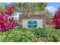 A stone sign marks the entrance to the community recreational area at 11225 Cypress Trail Dr, Orlando, FL 32825
