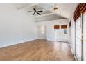 Bright living room with vaulted ceilings, ceiling fan, and wood-look flooring at 1308 S Pennsylvania Ave # 3, Winter Park, FL 32789