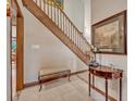Entryway featuring tiled floors, staircase, and decorative accents at 1905 Old Club Pt, Maitland, FL 32751