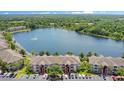 Aerial view of complex showcasing the building's proximity to the serene lake at 1979 Summer Club Dr # 111, Oviedo, FL 32765