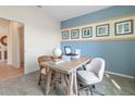 Stylish office featuring a wooden desk, coastal themed decor, and bright natural light at 3318 Arch Ave, Ormond Beach, FL 32174
