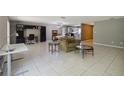 Open living room with tile floors features lots of floor space and open layout at 4806 Gallant Ln, Orlando, FL 32821