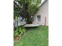 Backyard features a hammock, mature trees, and nice landscaping for relaxing outdoors at 300 Churchill Dr, Longwood, FL 32779