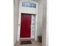 Stylish front door with sidelight and decorative accents welcomes you home at 300 Churchill Dr, Longwood, FL 32779