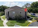 Charming condo featuring well-maintained landscaping and a classic architectural style at 4704 Walden Cir # 21, Orlando, FL 32811