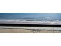 Beautiful balcony view overlooking the beach and waves from this amazing condo at 5275 S Atlantic Ave # 506, New Smyrna Beach, FL 32169