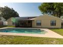 A lovely private in-ground swimming pool with a screened-in lanai for outdoor enjoyment at 5547 Garden Grove Cir, Winter Park, FL 32792