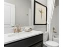 Bright bathroom featuring a vanity with modern fixtures, a mirror, and shower at 7876 Marlow Pl, Kissimmee, FL 34746