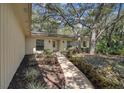 Inviting single-story home with a landscaped front yard and a cozy entrance at 107 Wayland Cir, Longwood, FL 32779